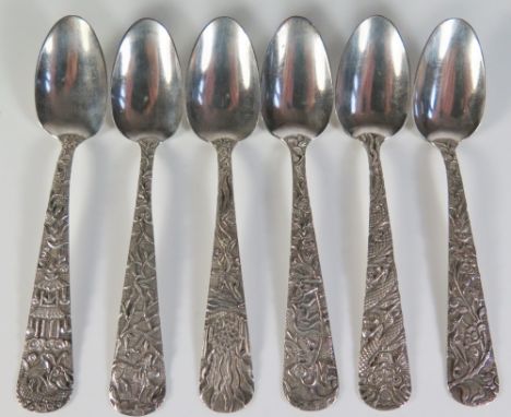 A Set of Six Chinese Silver Teaspoons with foliate decorated handles