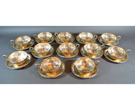 A Set of Twelve 800 Mark Silver Cups and Saucers 55 ozs. 