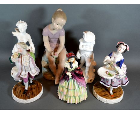 A Nao Figure in the form of a girl sitting on a rock, 30 cms tall together with a Royal Doulton figure 'The Victorian Lady' H