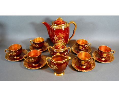 A Carlton Ware Rouge Royale Coffee Service comprising coffee pot, cream jug, covered sucrier and six cups and saucers 