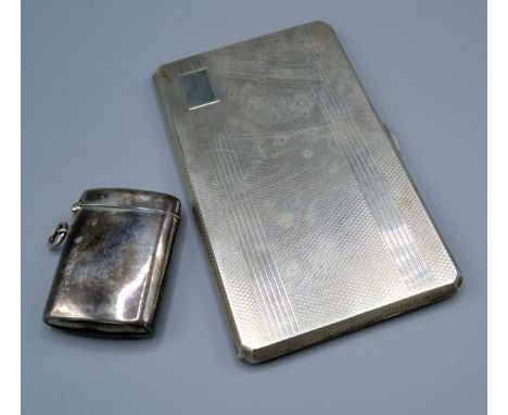 A Birmingham Silver Cigarette Case with engine turned decoration together with a London silver vesta case 