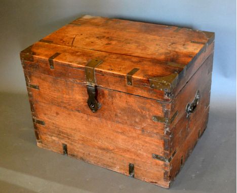A 19th Century Brass Banded Trunk with end handles, 56 cms wide, 42 cms deep, 40 cms high 