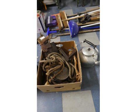 A Box Containing Large Aluminium Kettle, Shoe Last, Rope Pulley Block, Saws and Tools 