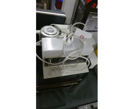 A Vintage Teasmade with Alarm Clock 