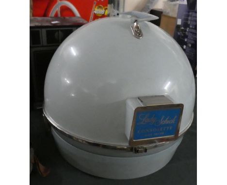 A Vintage Lady Schick Consolette Hair Dryer 