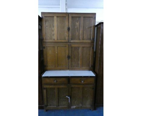 A Vintage Easiwork Kitchen Cabinet with Pull Out Enamel Work Top, Paper Labels to Panelled Doors, Fitted Interior and Two Dra