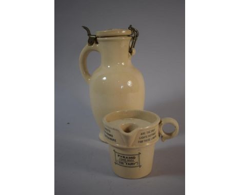 A Clarke's Pyramid Night Light Oil Jug and a Glazed Lidded Container Inscribed this Jug is the Property of Kannenbeer Ltd Lon