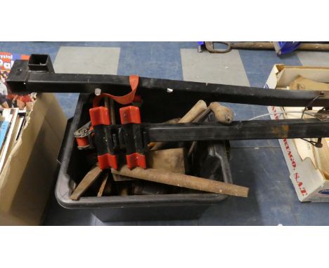 A Box of Tools and a Car Bicycle Carrier 