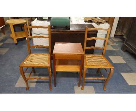 A Pair of Cane Seated Ladder Back Bedroom Chairs and a Small Sewing Table 