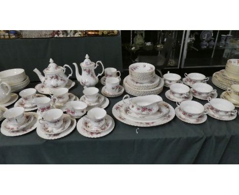 A Collection of Royal Albert Lavender Rose Tea and Coffeewares to Include Six Trios, Coffee Pot, Teapot, Sugar and Cream, Mug