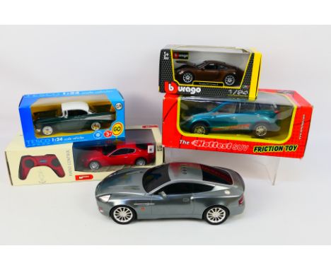 Mondo Motors - Burago James Bond - Others - Four larger scale vehicles to include two die casts; 1/24 Porsche 911 Carrea S (1