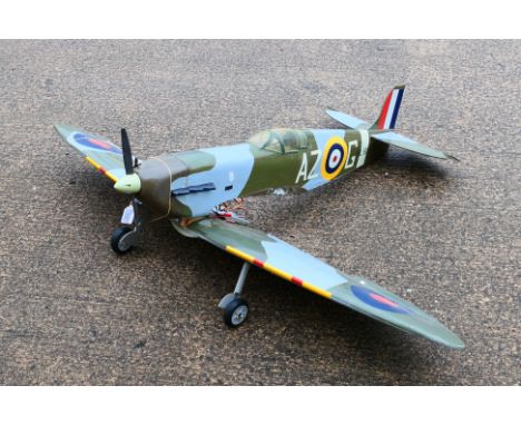 Spitfire - A large radio controlled model of a Supermarine Spitfire. The highly detailed, wood and composite, probably kit bu