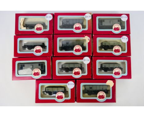 Dapol - A rake of 11 boxed items of rolling stock from Dapol. Lot includes 5-Plank Open wagon; 21T Hopper Wagon; 20T Brake Va