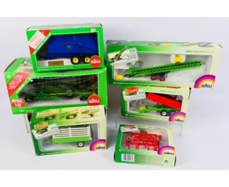 Siku - SIx boxed diecast 1:32 scale model farm implements from Siku. Lot includes Siku #2053 Amazone Cultivator Disk Harrow C