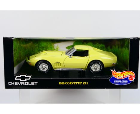Hot Wheels - A boxed 1:18 scale 1969 Corvette Stingray ZL1 # 21355. The car appears in Mint condition in a Very Good box with