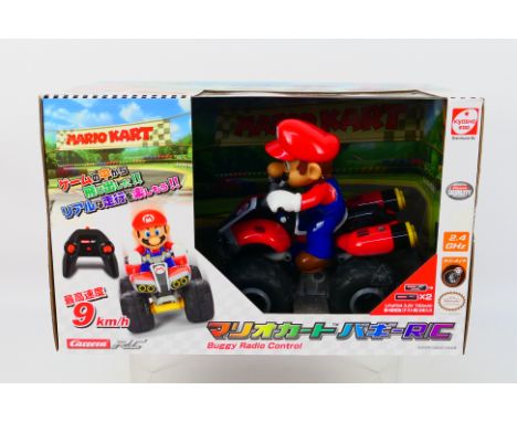 Carrera - A boxed Carrera 'Mariokart' radio controlled buggy. The model comes with controller and and appear to be in Mint co