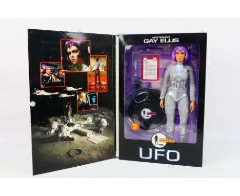 Product Enterprise - UFO - A UFO Lieutenant Gay Ellis Deluxe Talking Action Figure. This item is 10" tall and appears to be i