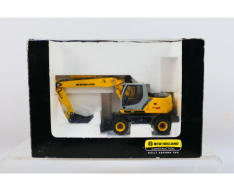 ROS (Italy) - A boxed ROS 1:50 scale diecast New Holland MH5.6 Wheeled Excavator.. Model appears Mint in Fair Plus window box