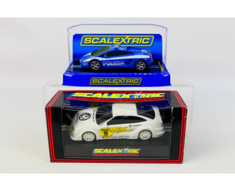 Scalextric - Two boxed Scalextric slot cars, comprising of Scalextric C2876 Lamborghini Gallardo 'Polizia'; and C632 Vauxhall