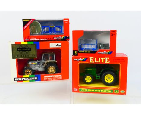 Britains - Two boxed Britains 1:32 scale model tractors with two boxed Britains farm implements. Lot consists of Britains Lim