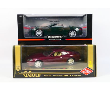 Minichamps - Guiloy - 2 x boxed Aston Martin models in 1:18 scale, the DB9 Convertible body shell is cracking up all over, th