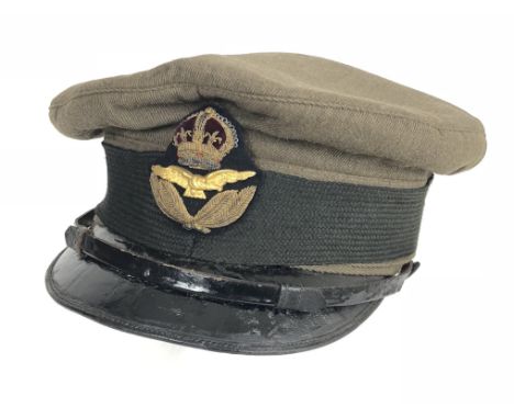 WW1 1918 RAF Officerâ€™s Khaki Cap.  A good scarce example of  khaki cloth material, with patent leather peak and chinstrap. 