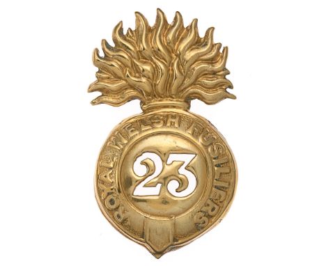 23rd (Royal Welsh Fusiliers) Victorian small glengarry / Torin cap badge c. 1874-81.  Good scarce die-stamped brass flaming g