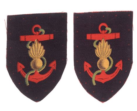 Royal Marine Engineers pair of printed cloth formation sign badges.  Good scarce examples. Each a yellow grenade on red foule