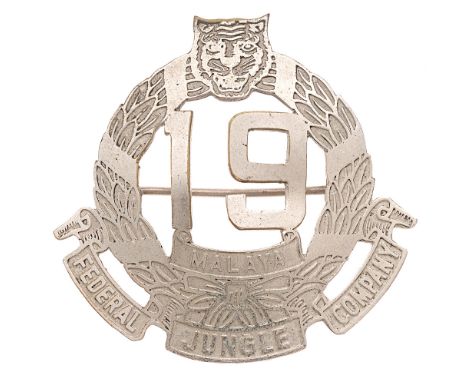 19th Federal Jungle Company Malay head-dress badge c. 1951.  Good rare die-pressed white metal laurel wreath, surmounted by a