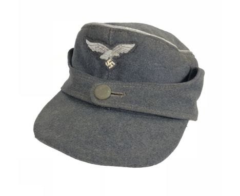 German Third Reich Luftwaffe M43 WW2 Officer peaked Field Cap. Good grey woollen example having fold down curtain secured wit