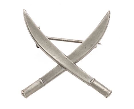91st Punjabis (Light Infantry) Indian Army pagri c. 1903-22.  Good scarce die-cast white metal crossed dhas.     Original bro