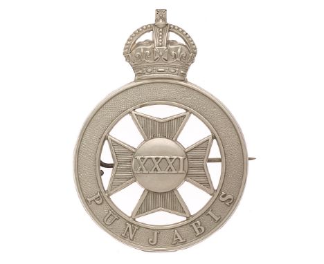 31st Punjabis Indian Army pagri badge c. 1903-22.  Good scarce British made large die-stamped white metal crowned PUNJABIS ci