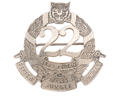 22nd Federal Jungle Company Malay head-dress badge c. 1951.  Good rare die-pressed white metal laurel wreath, surmounted by a