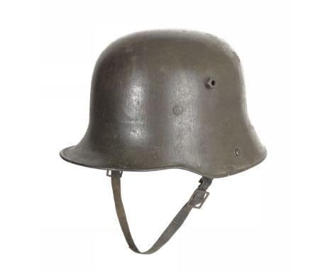 Imperial German WW1 Steel Helmet.  A very good and scarce example with original green painted finish to the skull. The interi