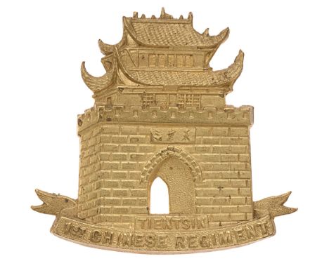 1st Chinese or Weihaiwei Regiment cap badge c. 1898-1906. Good scarce British made die-stamped brass representation of a city
