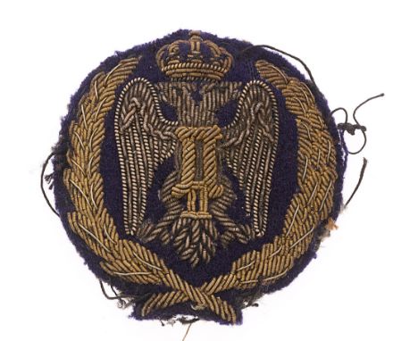 Yugoslav Army WW2 Officer's bullion cloth cap badge. Good rare circular gold wire embroidered padded example. Crown over doub