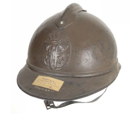 WW1 Romanian M15 Adrian Pattern steel helmet.  A good example retaining original brown painted finish, complete with Serbian 