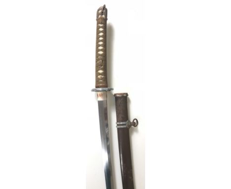 WW2 Japanese Katana Officer's Sword.  This example with a 27 inch single edged blade. Fitted with military pattern furniture 