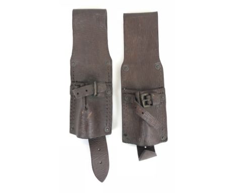 2 x WW1 1914 Equipment Bayonet Frogs.  Two good examples both complete with tang and retaining straps, also issue stamps. One
