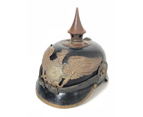 WW1 Imperial German Prussian Garde Regiment Pickelhaube. A good and scarce example polished black leather skull, with brass f
