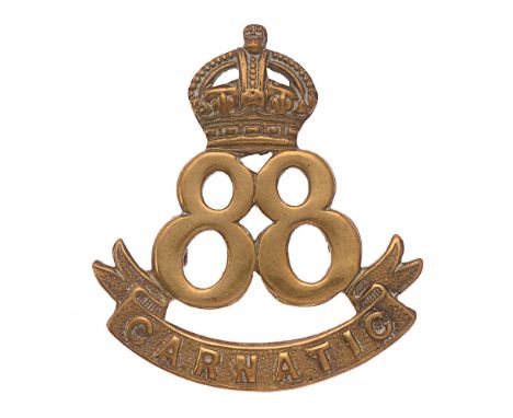 88th Carnatic Infantry Indian Army cap badge c. 1903-22.  Good scarce British made die-stamped brass crowned 88 on CARNATIC s