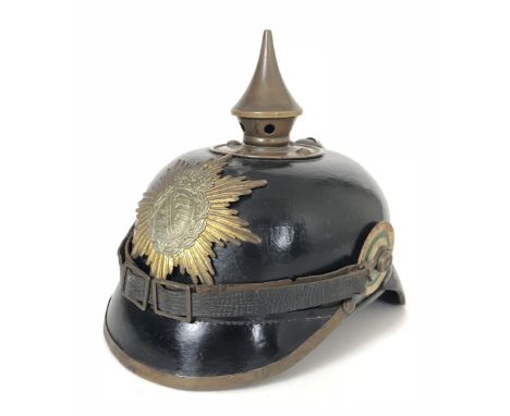 WW1 Imperial German Saxon State Pickelhaube  A  good example polished black leather skull, with brass metal fittings, complet