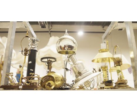 Collection of lamps and lights to include a brass hanging nautical-style light, a pair of Eastern Express reproduction railwa