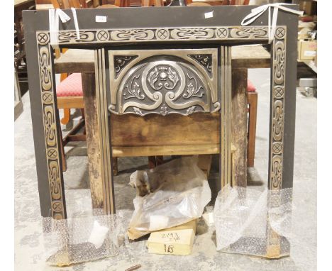 Cast iron fire surround&nbsp;with a fitted grate, 100cm wide approx.&nbsp;