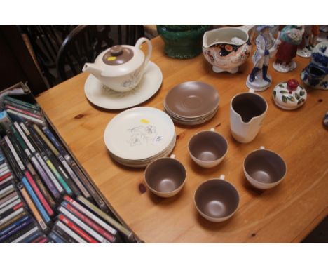 A quantity of Poole pottery twin tone teaware 