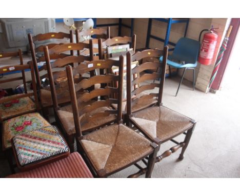 A set of six elm rush seated ladder back dining chairs 