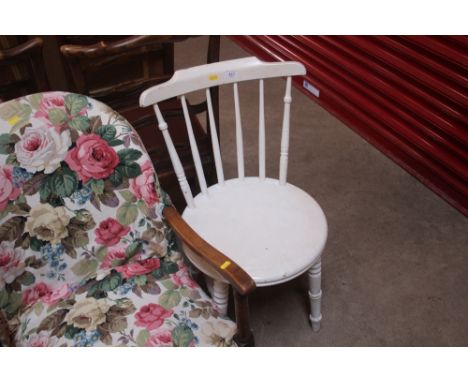 A white painted stick back kitchen chair 