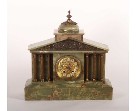 A late 19th century green onyx mantel clock, of architectural form, having a dome top surmounted by a brass finial with alleg