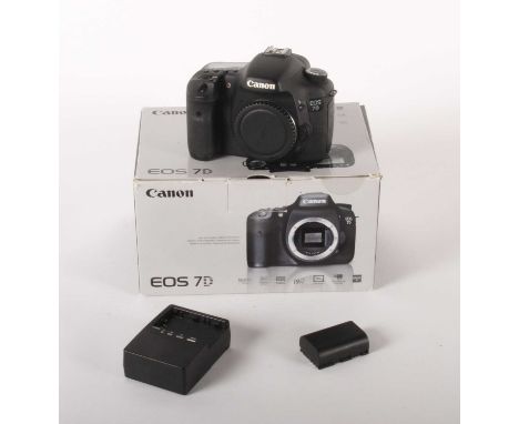 A Canon Eos 7D digital SLR camera, boxed with accessoriesThe camera has two bent or snapped pins in the CF card slot, and wil