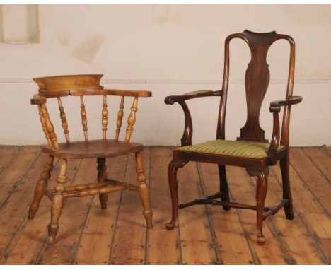 An elm seated smoker's bow or Captain's chair, together with an early 20th-century walnut framed splat back scroll elbow chai